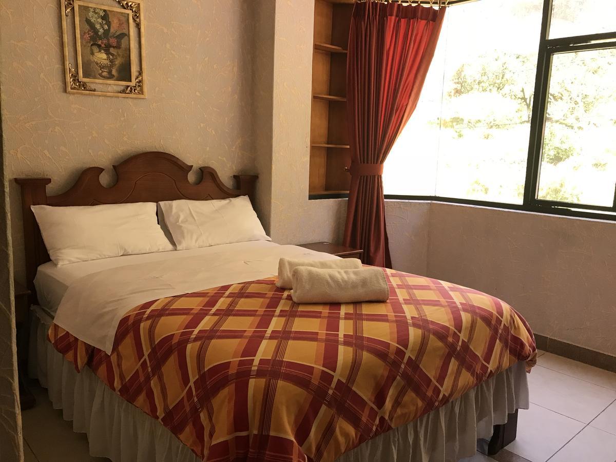 Hotel Puerta Del Sol Baños Exteriör bild