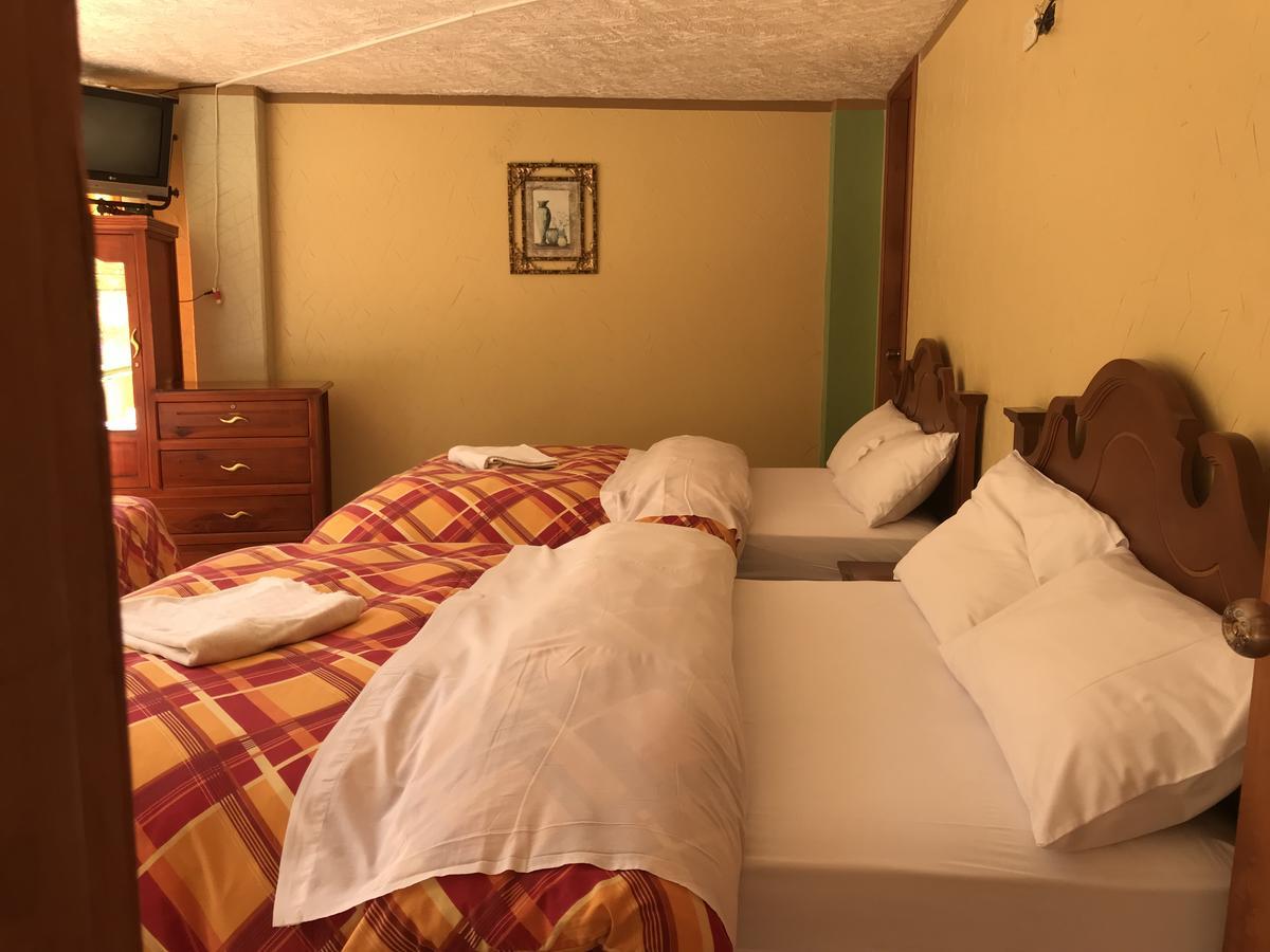 Hotel Puerta Del Sol Baños Exteriör bild